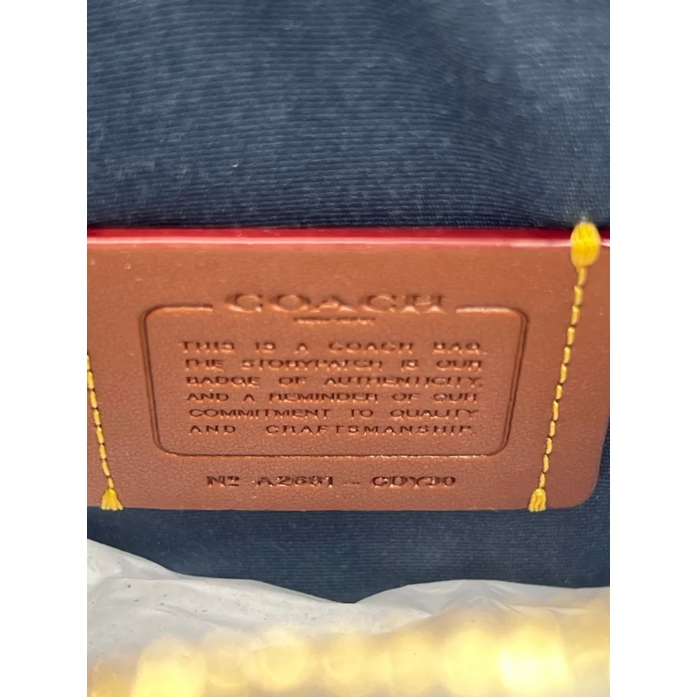 Coach Mini Rowan Crossbody Bag In Loved Denim With Charms
